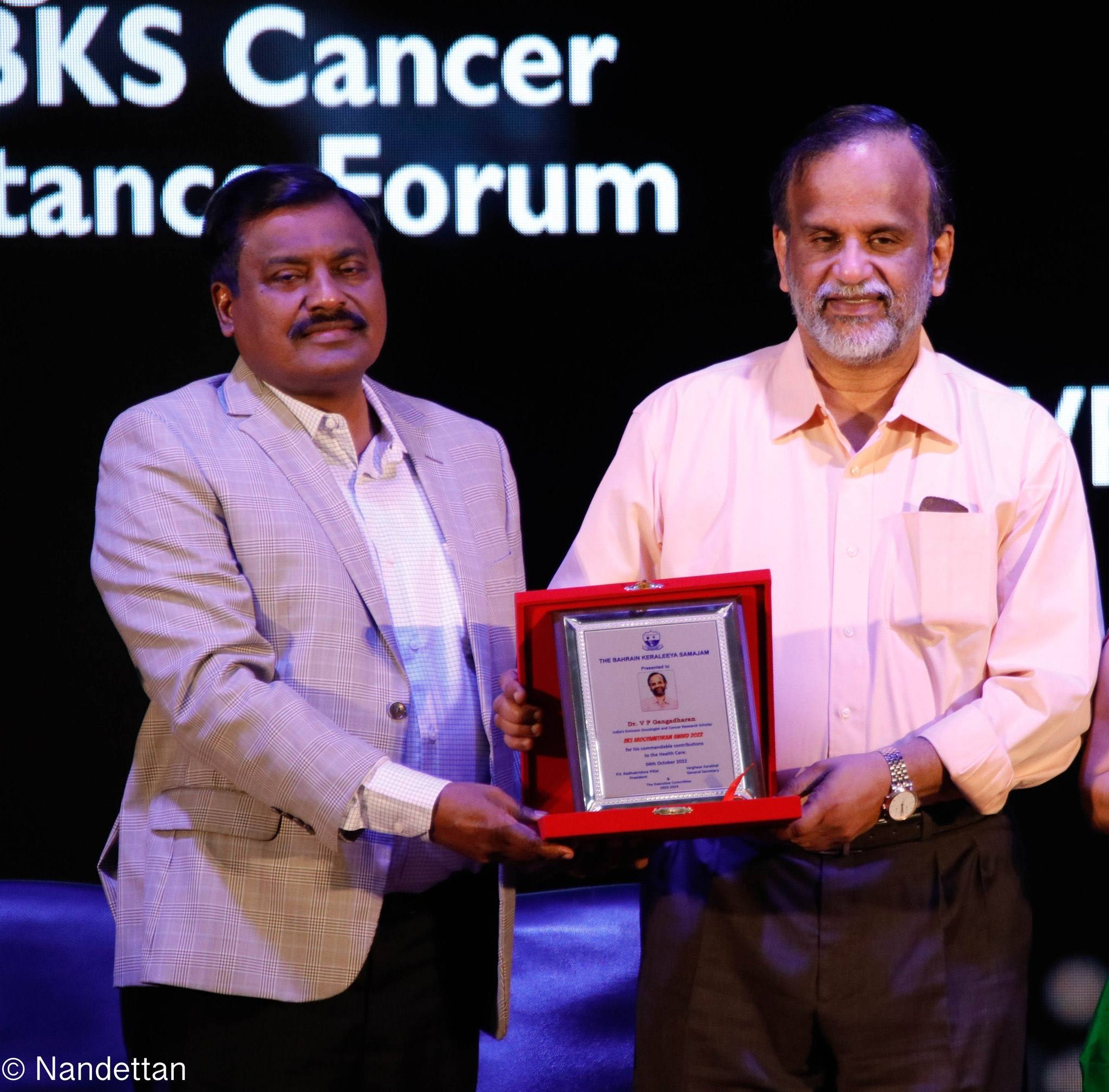 Bks presents the arogyamitram award to dr gangadharan for his